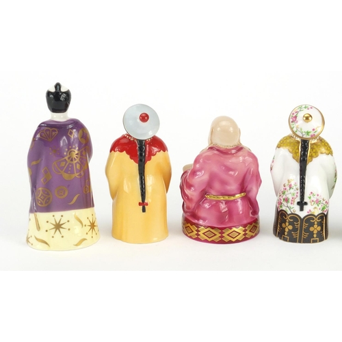 2595 - Five Royal Worcester candle snuffers comprising smiling Buddha, sleeping Buddha, samurai and two man... 