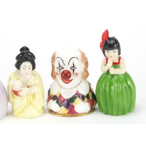 2607 - Four Royal Worcester candle snuffers comprising Japanese girl, clown and two hush, some limited edit... 