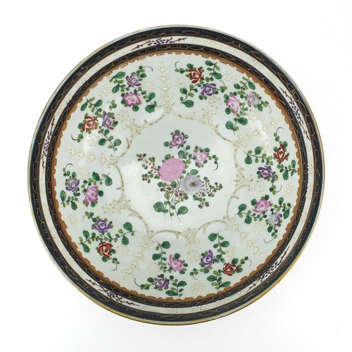 721 - Samson porcelain footed bowl, hand painted with an armorial crest and flowers, 25cm in diameter