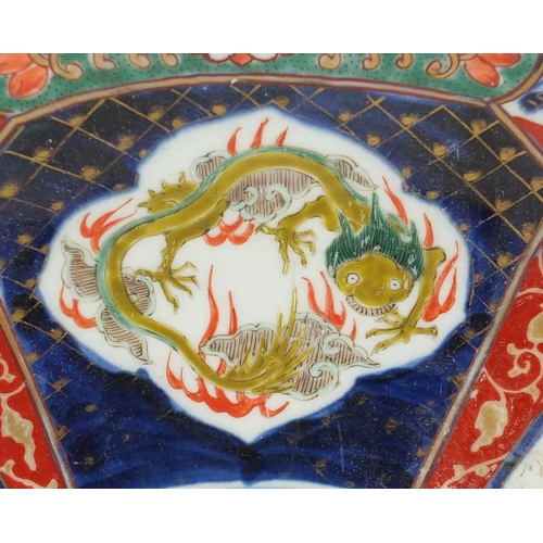 498 - Japanese Imari porcelain charger, hand painted with dragons, cherry blossom and a mythical animal, 4... 