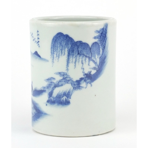 449 - Chinese blue and white porcelain cylindrical brush pot, hand painted with a fisherman in a continuou... 