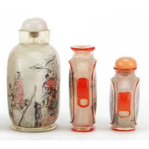 535 - Five Chinese glass snuff bottles comprising a Peking example and four others internally hand painted... 