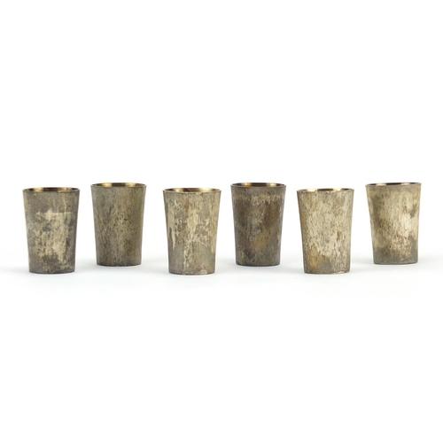 879 - Set of six silver beakers with gilt interiors, each stamped 800 S J ?, housed in a fitted box, 4.1cm... 