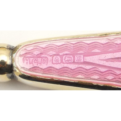 866 - Silver gilt and pink guilloche enamel five piece manicure set, by Henry Clifford Davis, housed in a ... 