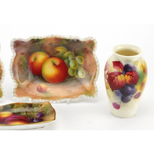 695 - Two pieces of Royal Worcester porcelain and a pair of dishes hand painted with fruit by A Shuck, the... 