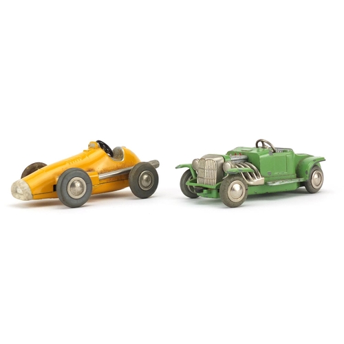 152 - Two Schuco micro-racer clock work cars with boxes, comprising numbers 1036 and 1040