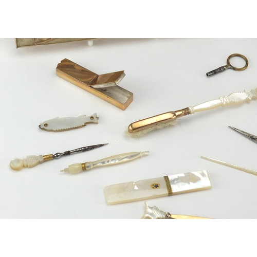 44 - 19th century French Palais Royal musical Necessaire with mother of pearl mounted implements and a go... 