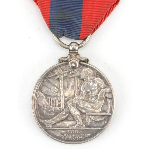 351 - British Militaria including a George V faithful service medal awarded to WILLIAM JOHN TURNER, silver... 