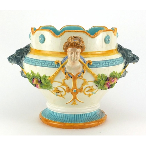 699 - Victorian Majolica jardinière by Wedgwood, decorated with maiden heads, lion masks and swags of frui... 