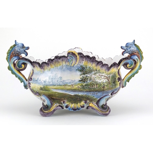 730 - Italian Majolica centre piece with twin dragon handles, possibly by Angelo Minghetti, hand painted w... 