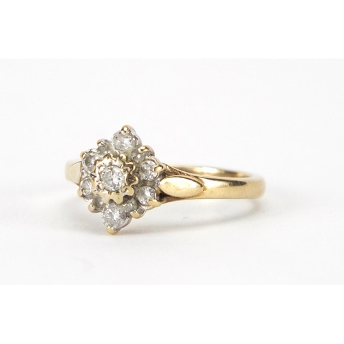 951 - 18ct gold diamond flower head ring, size N, approximate weight 3.0g