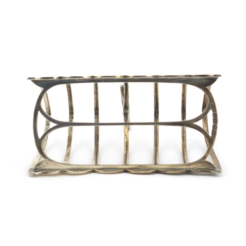 847 - Victorian silver six slice toast rack, by William Hutton & Sons London 1885, 11cm in length, approxi... 