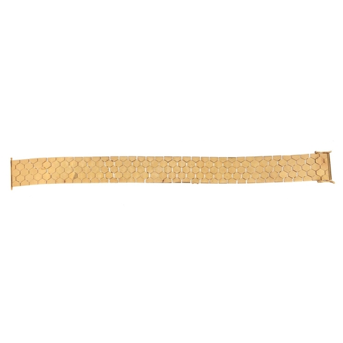 944 - Unmarked gold flattened link bracelet, 20cm in length x 2cm wide, approximate weight 65.5g