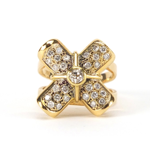 943 - Heavy 18ct gold diamond cross ring, size N, approximate weight 14.6g