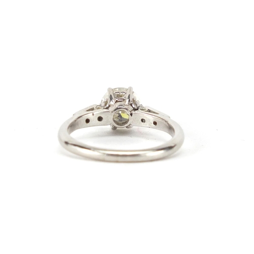 911 - Unmarked white gold diamond solitaire ring with diamond set shoulders, size J, approximate weight 4.... 
