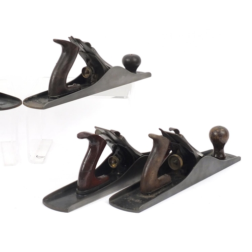 181 - Six vintage Stanley wood working planes comprising two No.5's, No.5a, two No.5½ and a No.G6