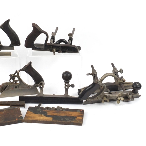 174 - Five vintage Stanley wood working combination planes comprising one No.45, one No.46 and three No.50... 
