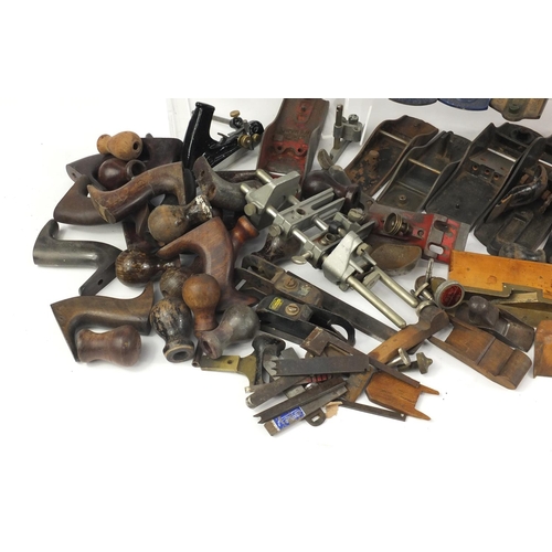 201 - Large collection of vintage wood working plane parts including Stanley, Brazil, Record, shoes, blade... 