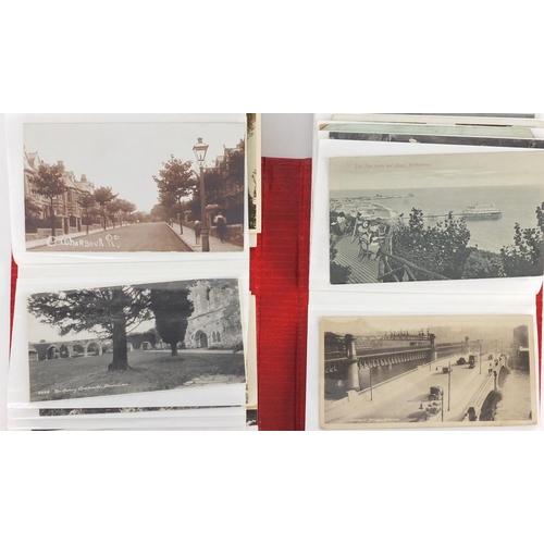 305 - Topographical and social history postcards arranged in three albums, some photographic including Dur... 