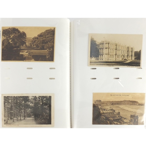 305 - Topographical and social history postcards arranged in three albums, some photographic including Dur... 