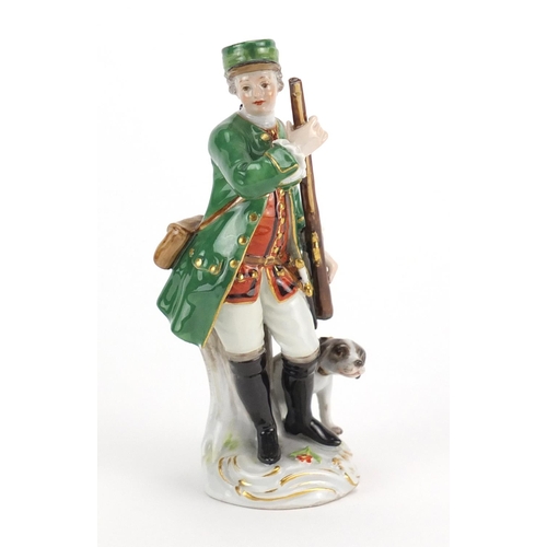 709 - 19th century Meissen porcelain figure of a huntress with a dog, blue cross sword marks to the base, ... 