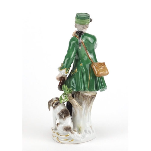 709 - 19th century Meissen porcelain figure of a huntress with a dog, blue cross sword marks to the base, ... 