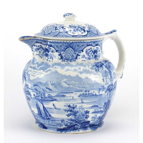 689 - Victorian blue and white lemonade jug, transfer printed with a continuous landscape, factory marks t... 