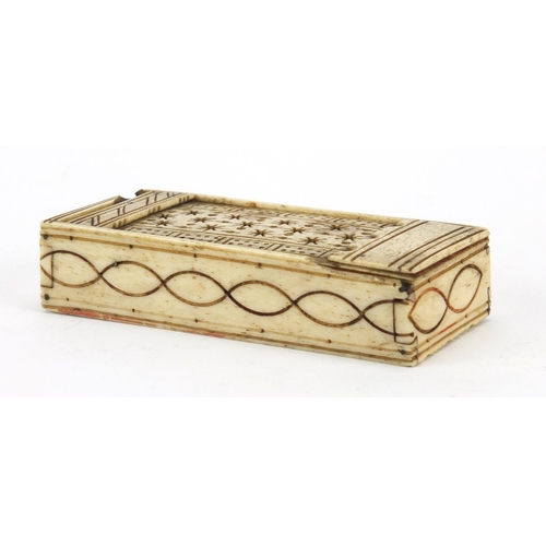 102 - 19th century prisoner of war bone dominoes and a carved cribbage board, the board 9.5cm wide