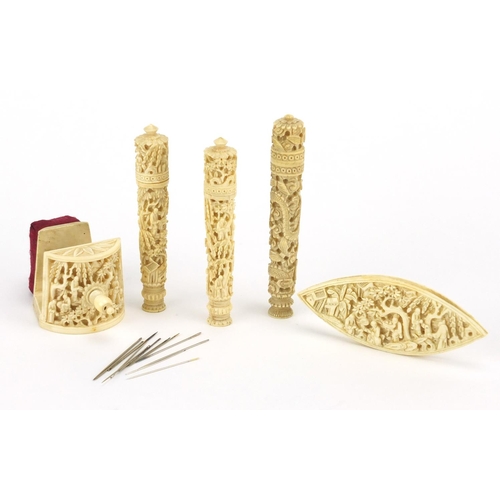 518 - Chinese Canton ivory sewing accessories including three needle cases carved with dragons and a tatti... 