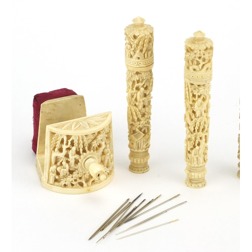 518 - Chinese Canton ivory sewing accessories including three needle cases carved with dragons and a tatti... 