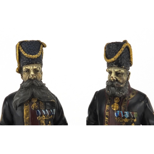 6 - Pair of Russian cold painted bronze figures impressed Fabergé, modelled as AA Kudinov and NN Pustynn... 