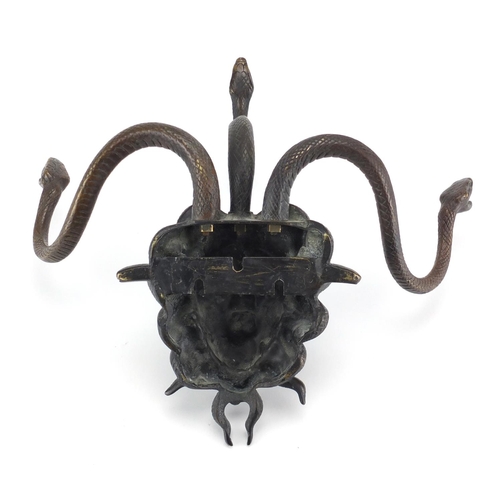 5 - Early 20th century patinated bronze wall mask of Medusa with three serpent hangers, 31cm high