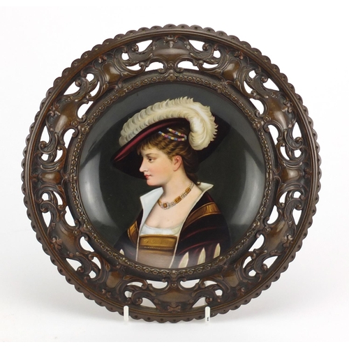 719 - 19th century continental cabinet plate, hand painted with a portrait of a young female, housed in a ... 