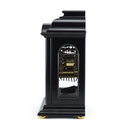 2266 - German Westminster Chiming ebonised mantel clock, by Kieninger, the silvered chapter ring with Arabi... 