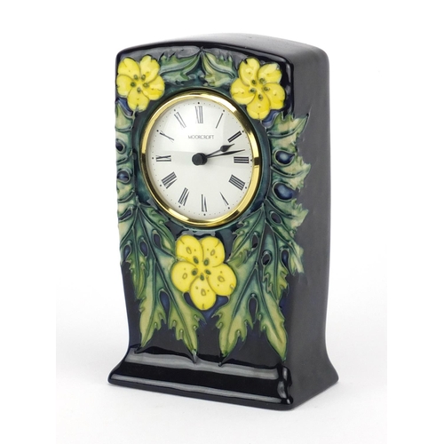 2215 - Moorcroft pottery buttercup mantel clock, with Roman numerals, 16cm high