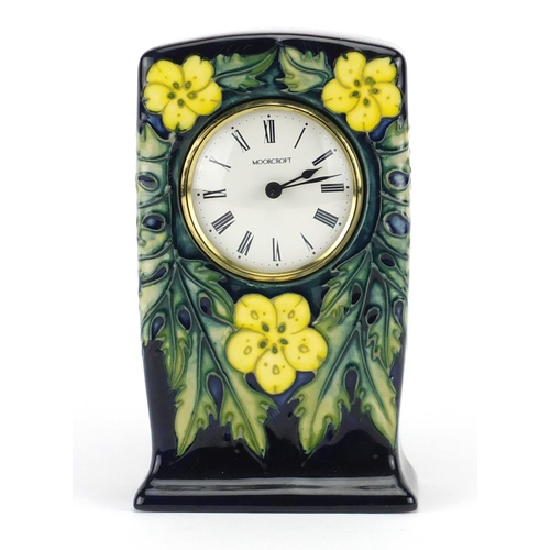 2215 - Moorcroft pottery buttercup mantel clock, with Roman numerals, 16cm high