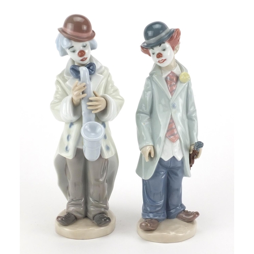 2272 - Pair of Lladro clown musicians, numbered 5471 and 5472, the largest 23cm high