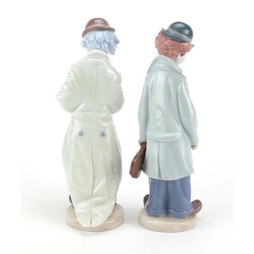 2272 - Pair of Lladro clown musicians, numbered 5471 and 5472, the largest 23cm high