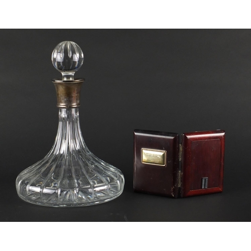 2257 - Cut glass ships decanter with silver collar and a silver frame/clock, both by Carrs, the largest 28c... 