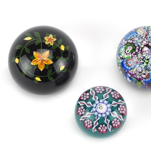 2282 - Four vintage Perthshire paperweights including three Millefiori examples, the largest 7.5cm in diame... 