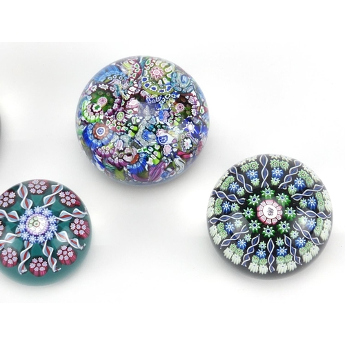 2282 - Four vintage Perthshire paperweights including three Millefiori examples, the largest 7.5cm in diame... 