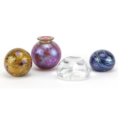 2214 - Glassware comprising a Norman Stuart Clarke iridescent paperweight, Isle of Wight vase and paperweig... 