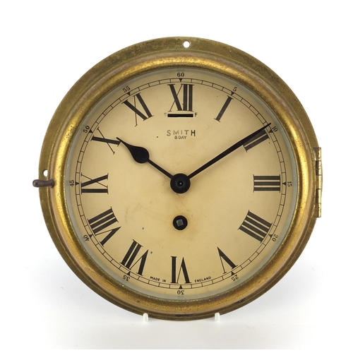 2288 - Smiths brass eight day ships bulk head design clock, by Smiths with Roman numerals, 22.5cm in diamet... 