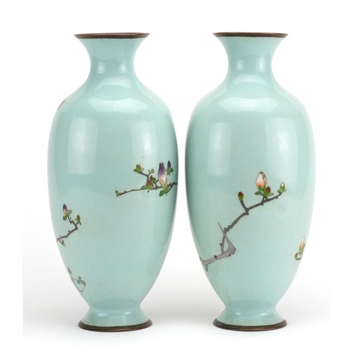 548 - Pair of Japanese cloisonné vases, each enamelled with blossoming flowers, each 31cm high