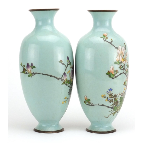 548 - Pair of Japanese cloisonné vases, each enamelled with blossoming flowers, each 31cm high