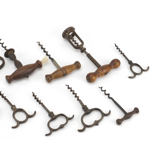 93 - Fifteen antique corkscrews including steel finger pull, straight pull with bone handle, straight pul... 