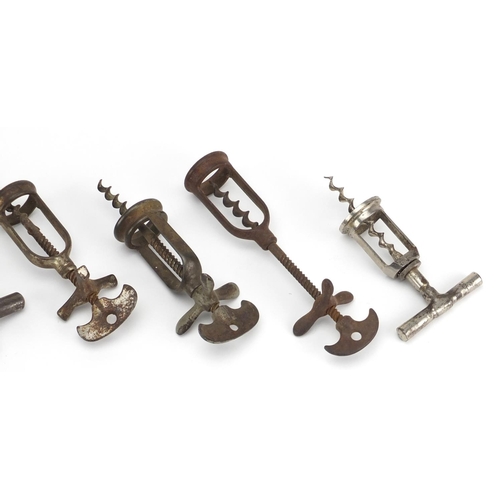 92 - Five 19th century steel corkscrews and a 1930's Monopol example, the largest 16cm in length