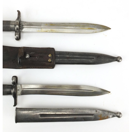 375 - Two Swedish Military interest mauser bayonets, one with leather frog, both with various impressed ma... 