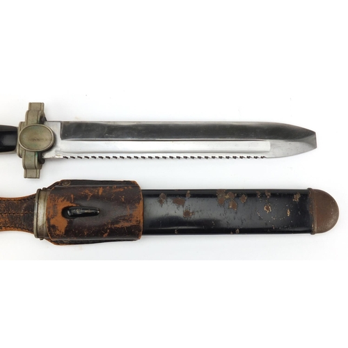 363 - German Military interest Hewer with saw back blade, scabbard and leather frog, 41.5cm in length