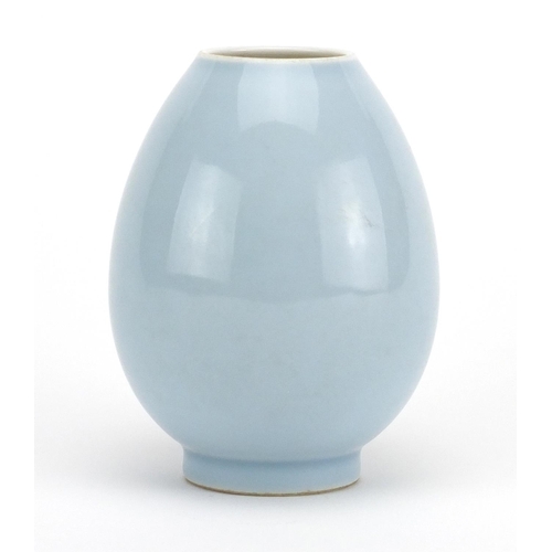 483 - Chinese light blue glazed footed vase, six figure character marks to the base, 10.5cm high